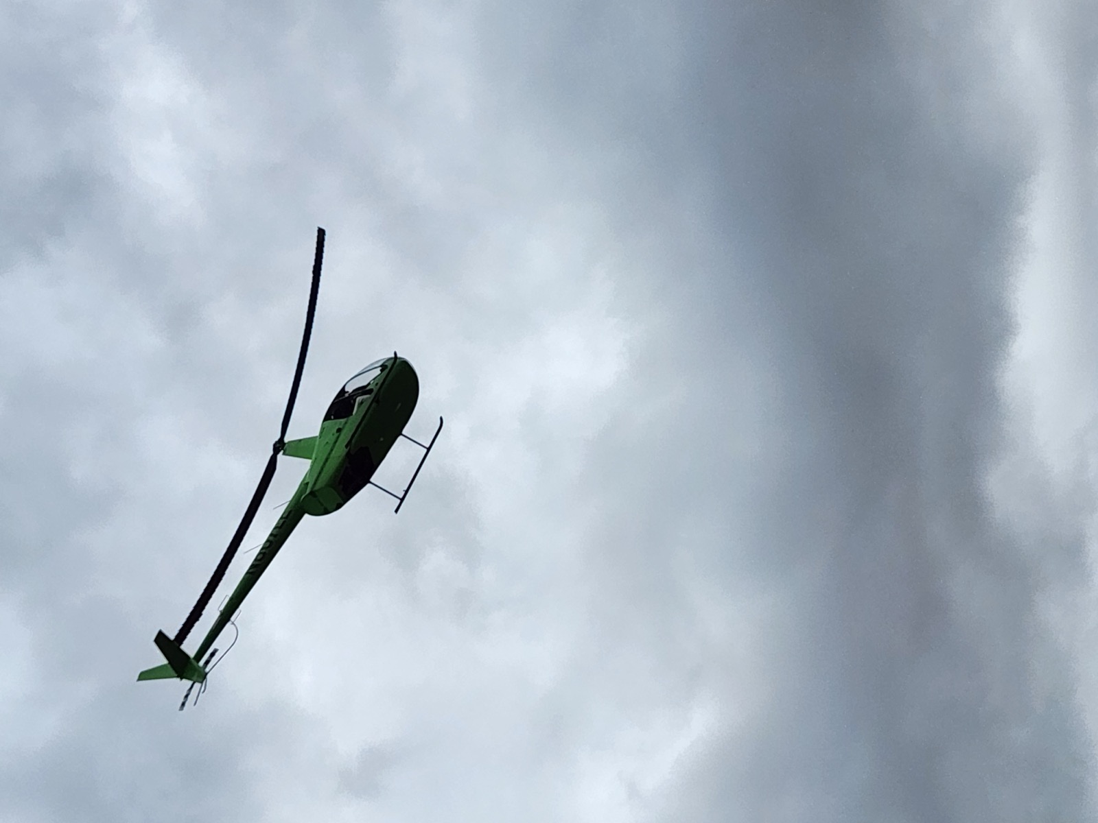 Robinson R44 helicopter in an out-of-ground-effect hover
